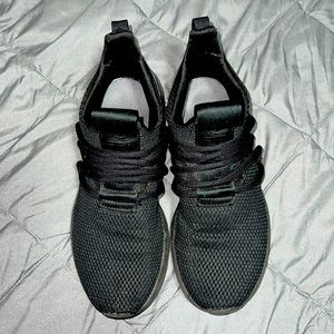 Boys adidas slip on sneakers black size 5. Good condition.